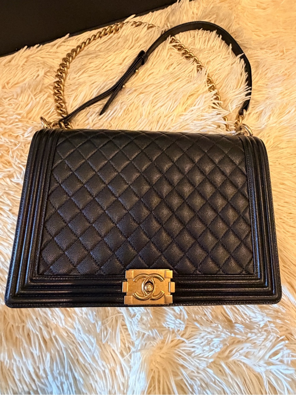 CHANEL Black Quilted Shoulder Bag with Gold Hardware and Chain Strap